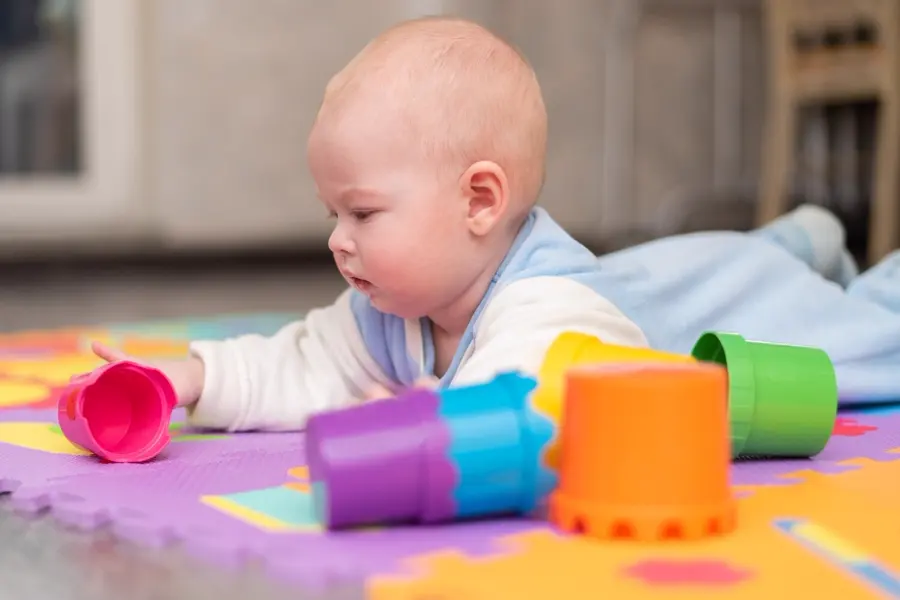 Baby Plays Floor Child Is Lying His Stomach Rug With Pyramid 114354 926