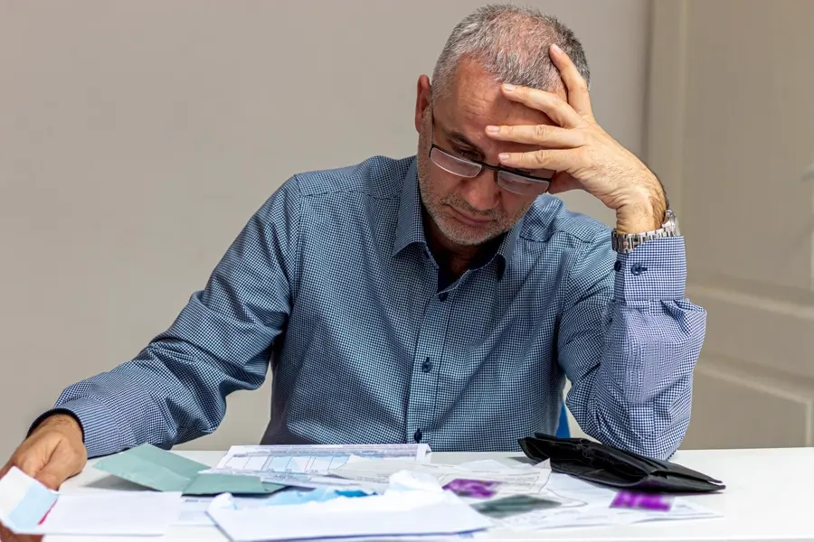 Close Up Businessman Busy Calculating Household Finances Taxes Expense From Invoice Bill 1048944 26657817